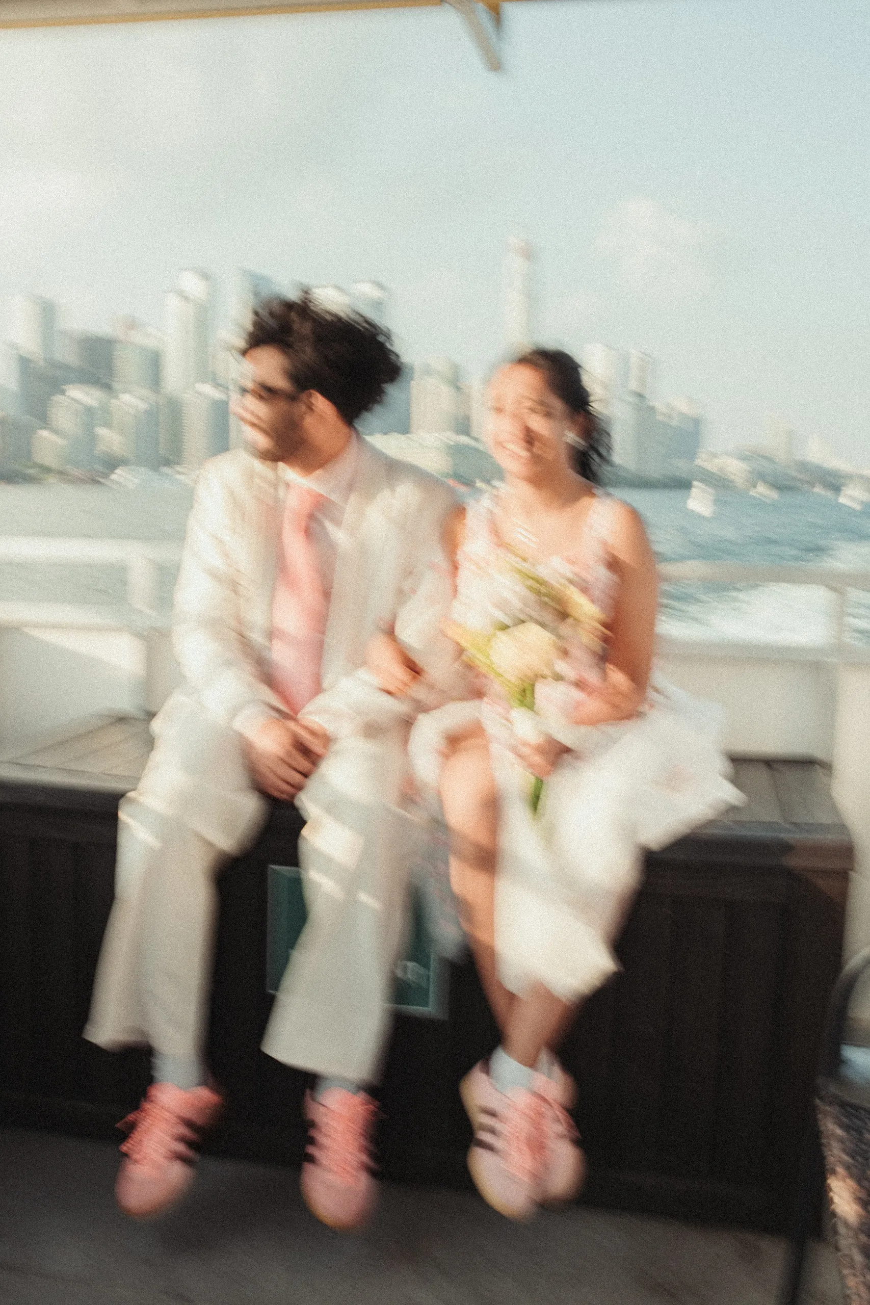 A slow shutter frame of Harsh mid jump on the ferry deck crossing to the Toronto Islands, by AD Photography
