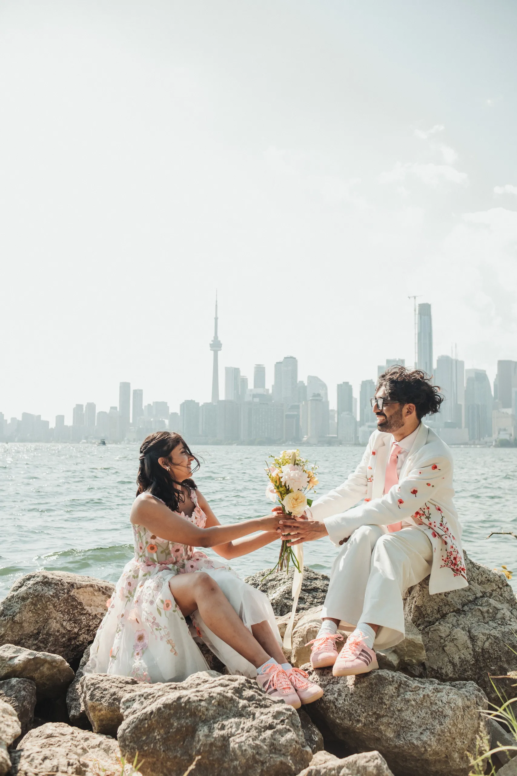 Payal laughing in a wildflower field in her coral floral gown, Toronto Islands, by AD Photography