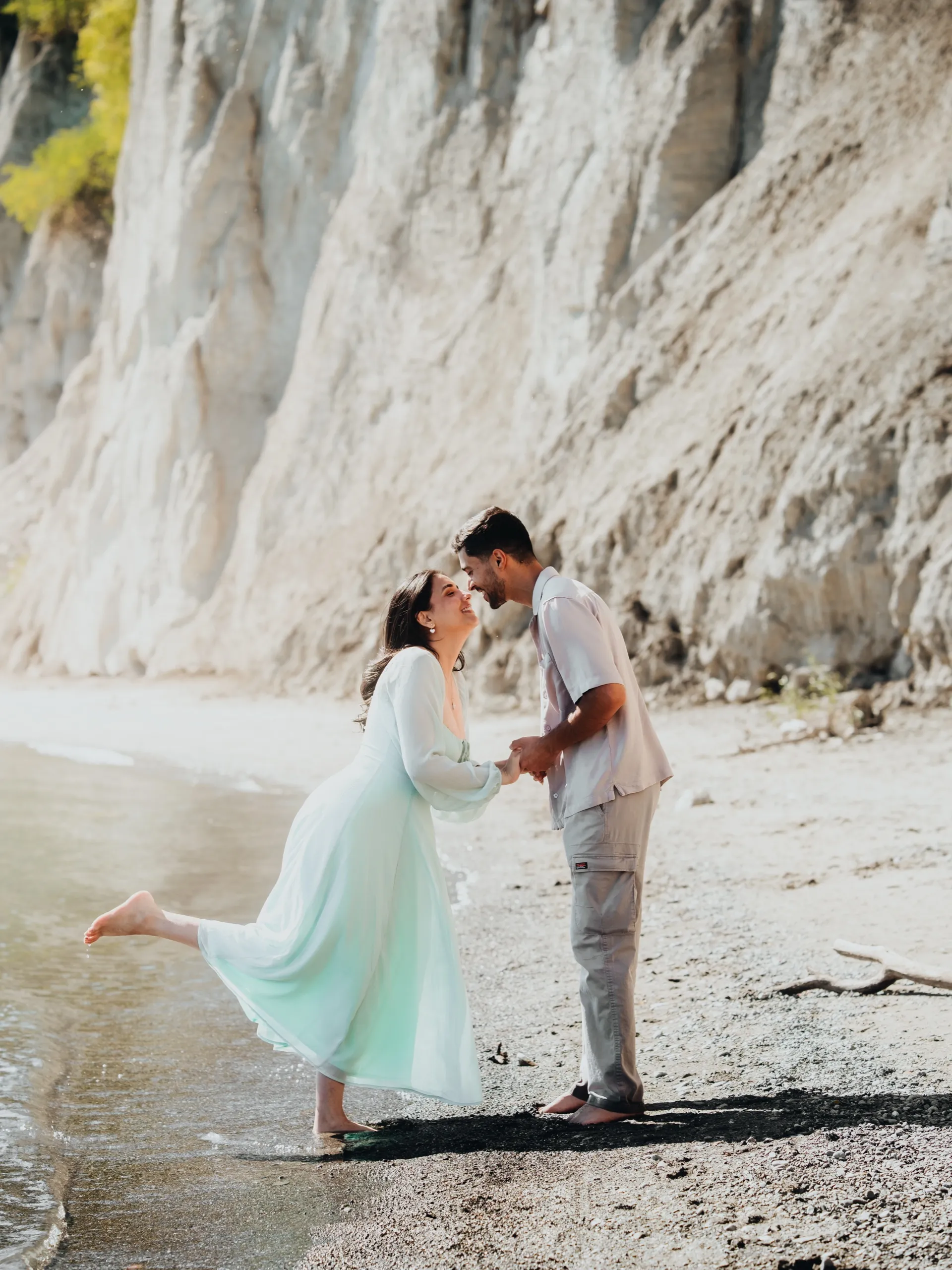 Swati pops her heel kissing Saksham beneath the chalk white cliffs, by AD Photography