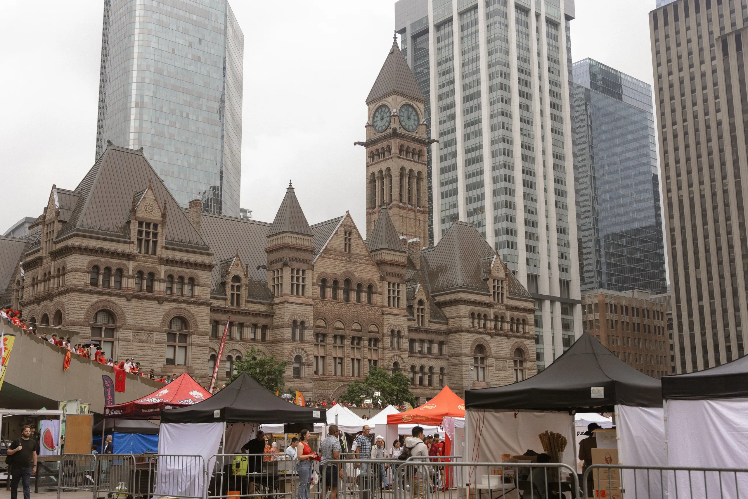 Old City Hall clock tower behind Nathan Phillips Square, by AD Photography