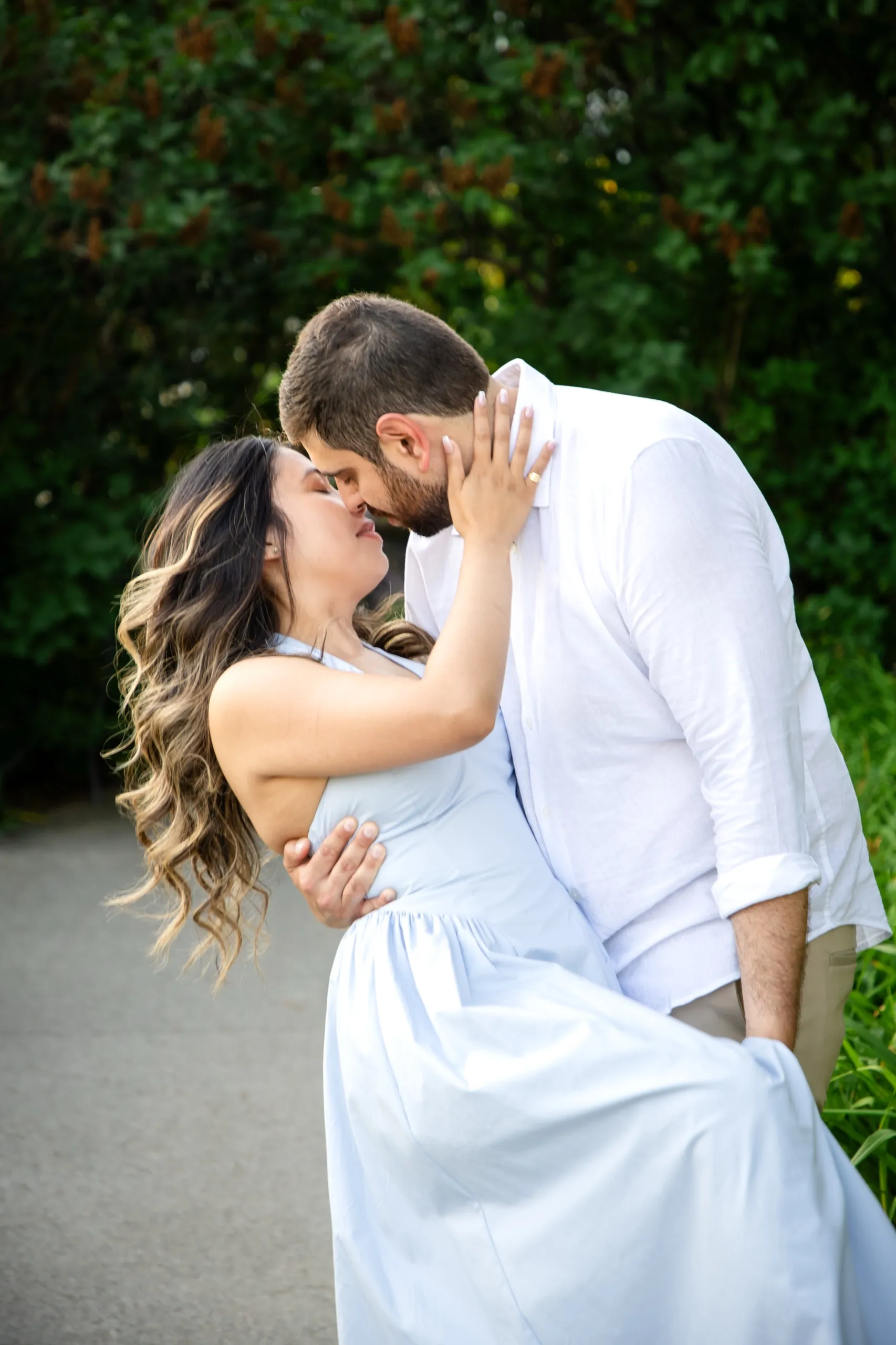 A dip kiss on the garden path at the Toronto Music Garden on the Toronto waterfront, by AD Photography