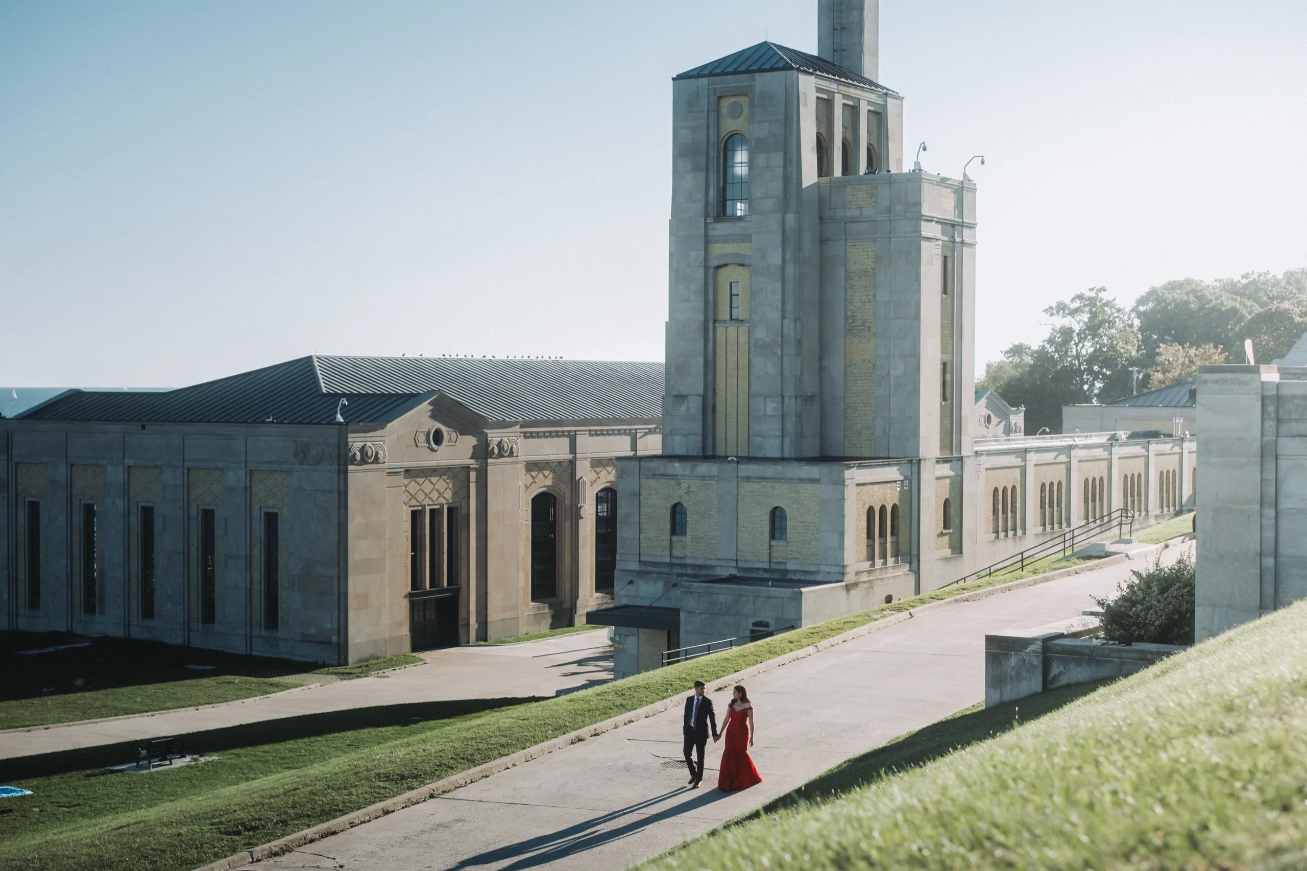 Swati's red gown crosses the grounds of the R.C. Harris Water Treatment Plant in Scarborough, by AD Photography