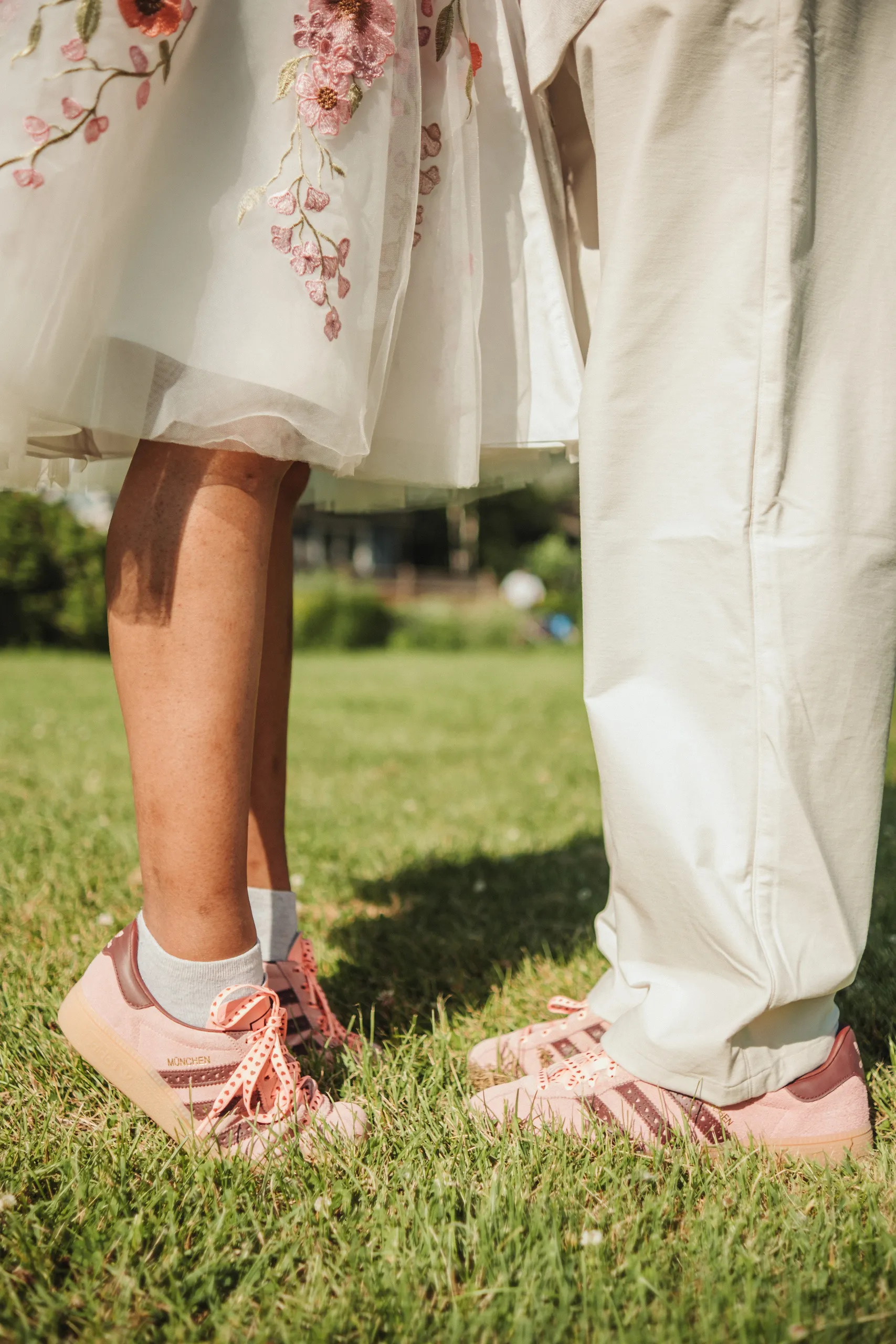 Harsh and Payal kissing with her bouquet raised behind his shoulder, Toronto Islands, by AD Photography
