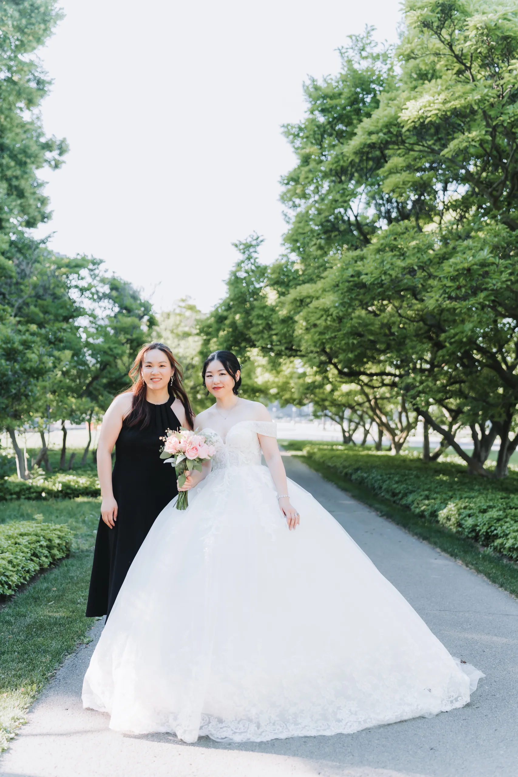 Karen with a close friend on the tree lined path at the Botanical Gardens in Niagara Falls, by AD Photography