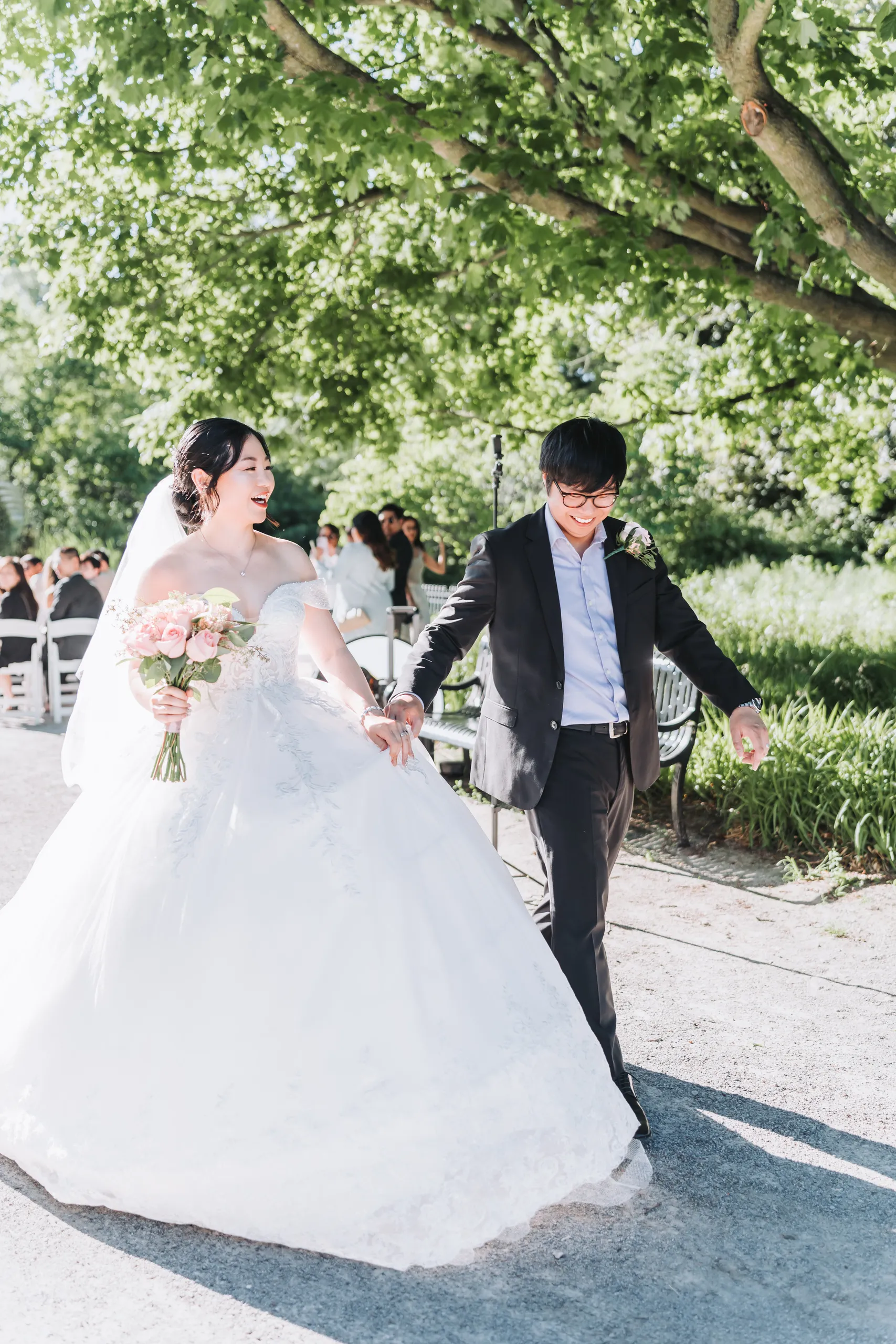 Karen and Micheal laughing together in dappled light on a Botanical Gardens path, Niagara Falls, by AD Photography
