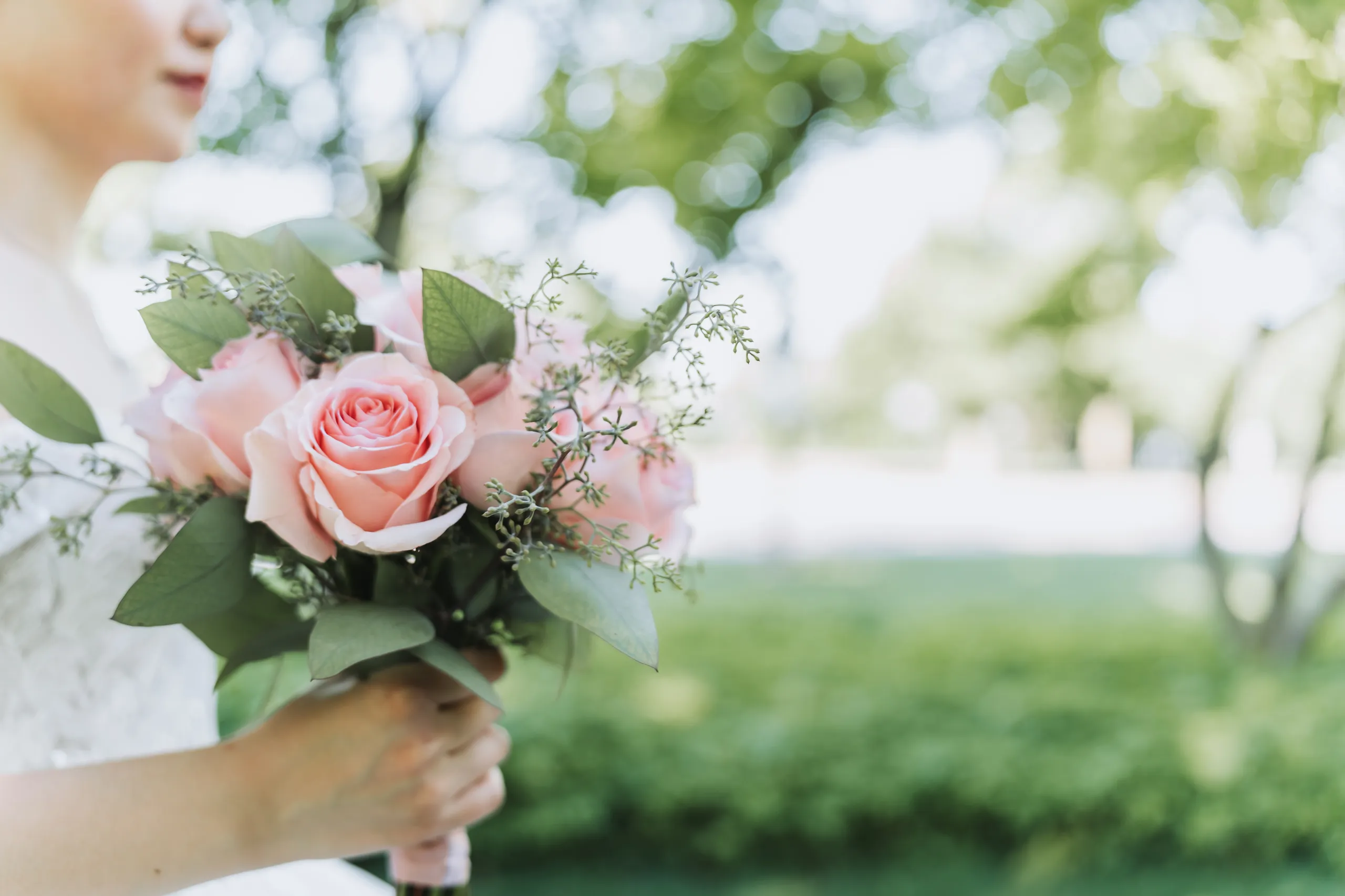 Macro detail of Karen's blush pink rose bouquet against soft garden bokeh in Niagara Falls, by AD Photography