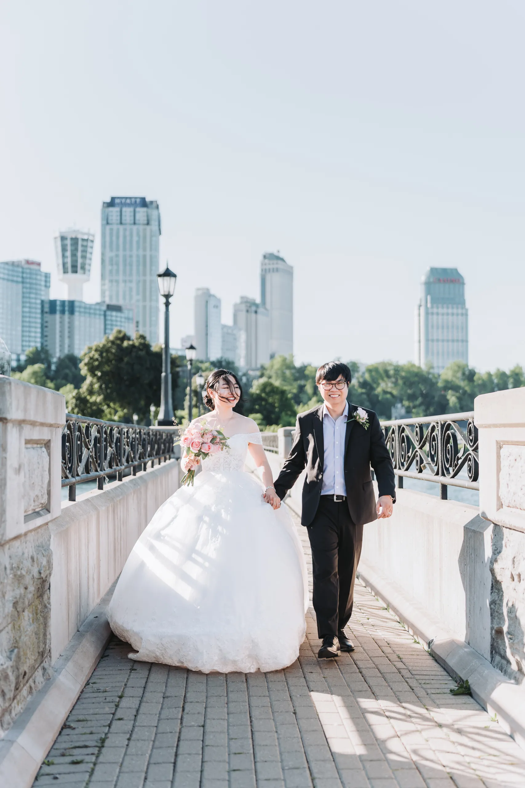 Karen and Micheal walking the Niagara Parkway promenade above the gorge, by AD Photography